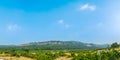 panorama of beautiful green hill, mountain. sunny day with clear blue sky. landscape in mountains. rural scenery