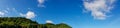 Panorama of Beautiful landscape mountain with clear blue sky and white cloud background. Clearing day and Good weather in the Royalty Free Stock Photo