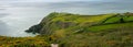 Panorama of beautiful scenery of Howth Head with Baily Lighthouse and green fields, county Dublin, Ireland