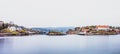 Panorama - The beautiful small islands around KjÃÂ¸nnÃÂ¸ya archipelago at calm foggy day. Hafsund, South Norway