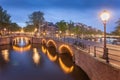 Panorama of beautifull Amsterdam canals with bridge, Holland Royalty Free Stock Photo