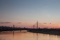 Panorama of Belgrade brigdes over the Sava river (Ada, Gazela, old and new railway bridges) taken on a sunset. Royalty Free Stock Photo