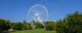 Panorama of Big white Ferris wheel in Olbia Sardinia Park against blue sky Royalty Free Stock Photo