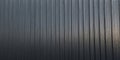panorama of black corrugated metal background and texture surface or galvanize steel. Royalty Free Stock Photo