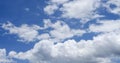 Panorama blue sky clouds pattern on daylight with copy space. Cumulus cloudscape air climate sunny day. Blue sky fluffy white Royalty Free Stock Photo