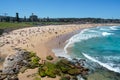 Panorama of Bondi beach on a hot sunny summer day with blue sky in Sydney Australia Royalty Free Stock Photo