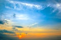 Panorama bright sunset with blue sky, white clouds and red sun Royalty Free Stock Photo