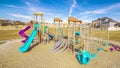 Panorama Brightly colored blue and purple play equipment