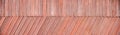 Panorama of a brightly painted wooden fence. Wooden planks pattern