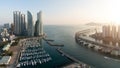 Panorama of Busan city skyline view at Haeundae district, Gwangalli Beach with yacht pier at Busan, South Korea. Royalty Free Stock Photo