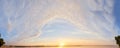 Panorama of Calm evening sky with clouds. Sky background after sunset. Sunrise sky with lighted clouds. Beauty evening sunrise Royalty Free Stock Photo