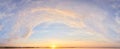 Panorama of Calm evening sky with clouds. Sky background after sunset. Sunrise sky with lighted clouds. Beauty evening sunrise Royalty Free Stock Photo