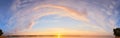 Panorama of Calm evening sky with clouds. Sky background after sunset. Sunrise sky with lighted clouds. Beauty evening sunrise Royalty Free Stock Photo