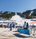 PANORAMA, CANADA - MARCH 21, 2019: Mountain Resort view early spring people skiing Royalty Free Stock Photo