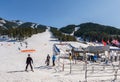 PANORAMA, CANADA - MARCH 21, 2019: Mountain Resort view early spring people skiing Royalty Free Stock Photo