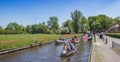 Panorama of a canal leading to the center of Giethoorn