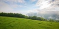 panorama of carpathian countryside with alpine meadows in morning light Royalty Free Stock Photo