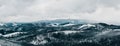 Panorama of Carpathian Mountains covered in snow in winter. Royalty Free Stock Photo