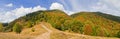 Panorama of Carpathians with the road to the mountains covered w