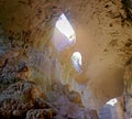 Panorama of the cave with falling light