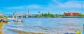 Panorama of Chao Phraya river with pier of Yodpiman boat station and modern neighborhood on background, Bangkok, Thailand Royalty Free Stock Photo