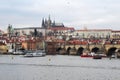 The panorama of the Charles bridge and Prazhsky Hrad in the center of Prague