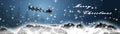 Panorama christmas - santa claus is flying with sleigh and reindeers over snowy mountain