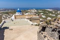 Panorama with church In the castle of Pyrgos Kallistis, Santorini island, Thira, Greece Royalty Free Stock Photo