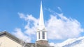 Panorama Church with snowy slope of Wasatch Mountains and cloudy blue sky background