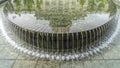 Panorama Circular pool and fountain reflecting the historic Utah State Capital Building