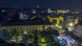 Panorama of the city center night timelapse shoot from top of the skyscraper with a view to the intersection in front of Royalty Free Stock Photo