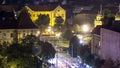 Panorama of the city center night timelapse shoot from top of the skyscraper with a view to the intersection in front of Royalty Free Stock Photo