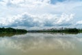 Panorama of city reflection in water under clouds during daytime Royalty Free Stock Photo