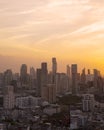 Panorama of cityscape with sunset over the building and blue sky at bangkok ,Thailand. View Vertical of the tall building in