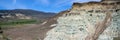 Panorama of the claystone hills and valley at the Sheep Rock Unit of the John Day Fossil Beds National Monument in Oregon, USA Royalty Free Stock Photo