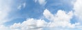 Panorama of clear blue sky with white cloud background. Clearing day and Good weather in the morning Royalty Free Stock Photo