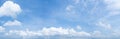 Panorama of clear blue sky with white cloud background. Clearing day and Good weather in the morning Royalty Free Stock Photo