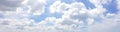 Panorama of clear blue sky with white cloud background. Clearing day and Good weather in the morning Royalty Free Stock Photo