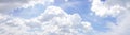 Panorama of clear blue sky with white cloud background. Clearing day and Good weather in the morning Royalty Free Stock Photo