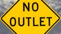 Panorama Close up view of a bright yellow and black No Outlet road sign Royalty Free Stock Photo