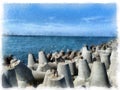 Panorama of the coast with breakwaters in the foreground. Royalty Free Stock Photo