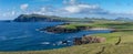 Panorama coastal landscape of the northern Dingle Peninsula with a view of Clogher Beach and the Dunurlin headland Royalty Free Stock Photo