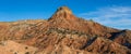 Panorama of a colorful desert landscape and high peak at Ghost Ranch