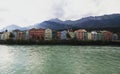 Panorama of colorful houses historic architecture Inn river from market square Marktplatz Innsbruck Tyrol Austria Alps