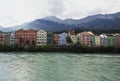 Panorama of colorful houses historic architecture Inn river from market square Marktplatz Innsbruck Tyrol Austria Alps