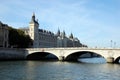 Conciergerie and  bridge Pont au Change in Paris Royalty Free Stock Photo