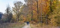 Panorama of a couple hiking in the forest near Borger