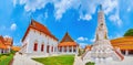 Panorama of courtyard of Wat Mahathat temple with Prang and Ubosot hall, Bangkok, Thailand Royalty Free Stock Photo