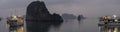 Panorama of cruise ships at sunset in Ha Long Bay Vietnam Royalty Free Stock Photo