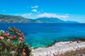 Panorama of crystal clear transparent blue turquoise teal Mediterranean seascape in Fiskardo town. Kefalonia, Ionian Royalty Free Stock Photo